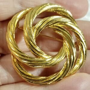 Vintage Monet signed ridged gold tone love knot 2" 1.1888